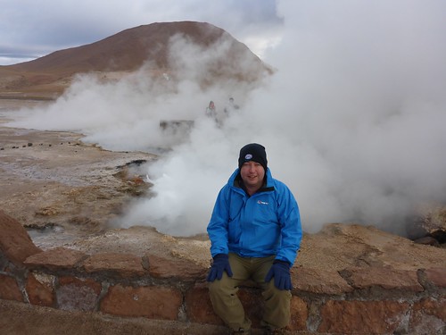 James in front of a Geyser